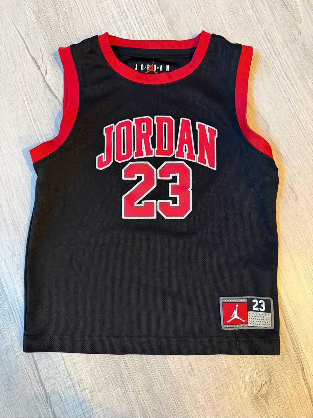 Jordan Black Sleeveless Basketball Jersey with Red Accents